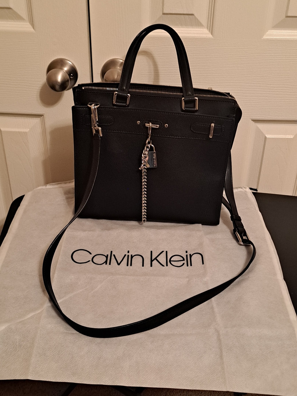 Calvin Klein Black Leather Tote Key Chain Charm log and dust bag.